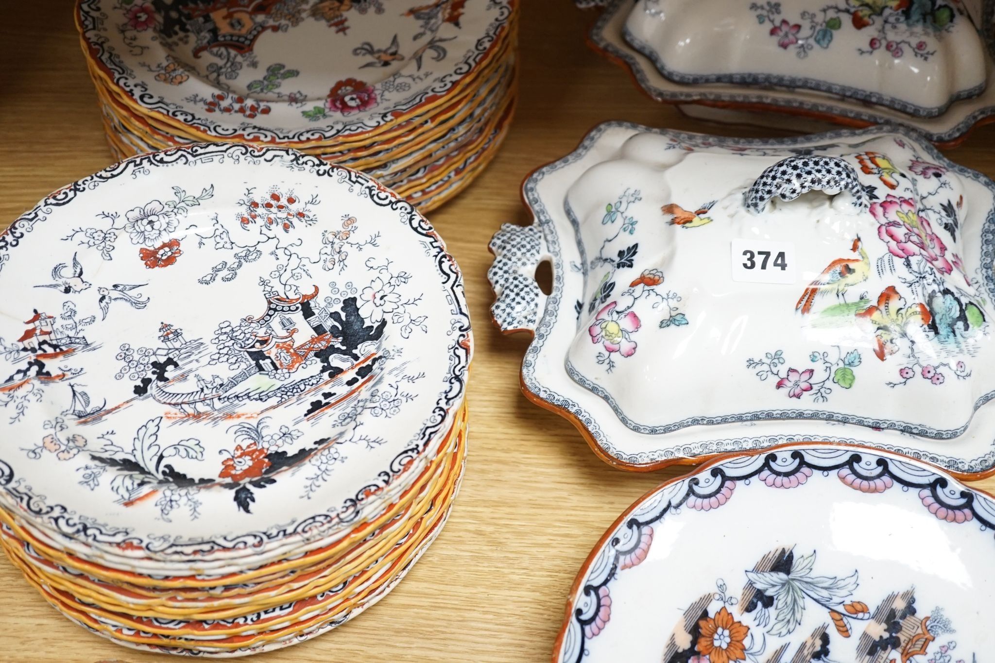 An Ashworths ironstone landscape pattern part dinner service